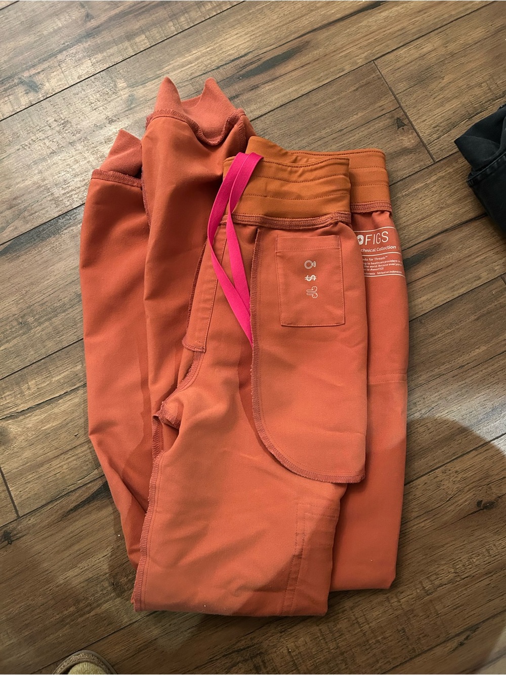 FIGS Technical Collection Scrub Joggers in Burnt Orange with Pink Accent